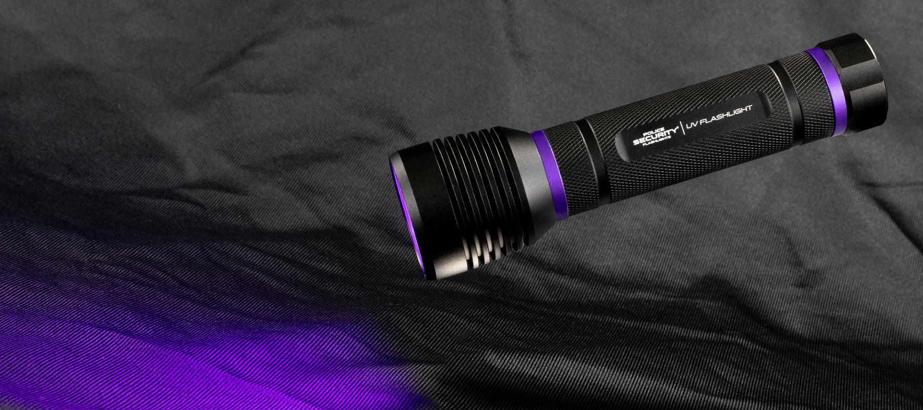 an image of a UV flash light on a black background