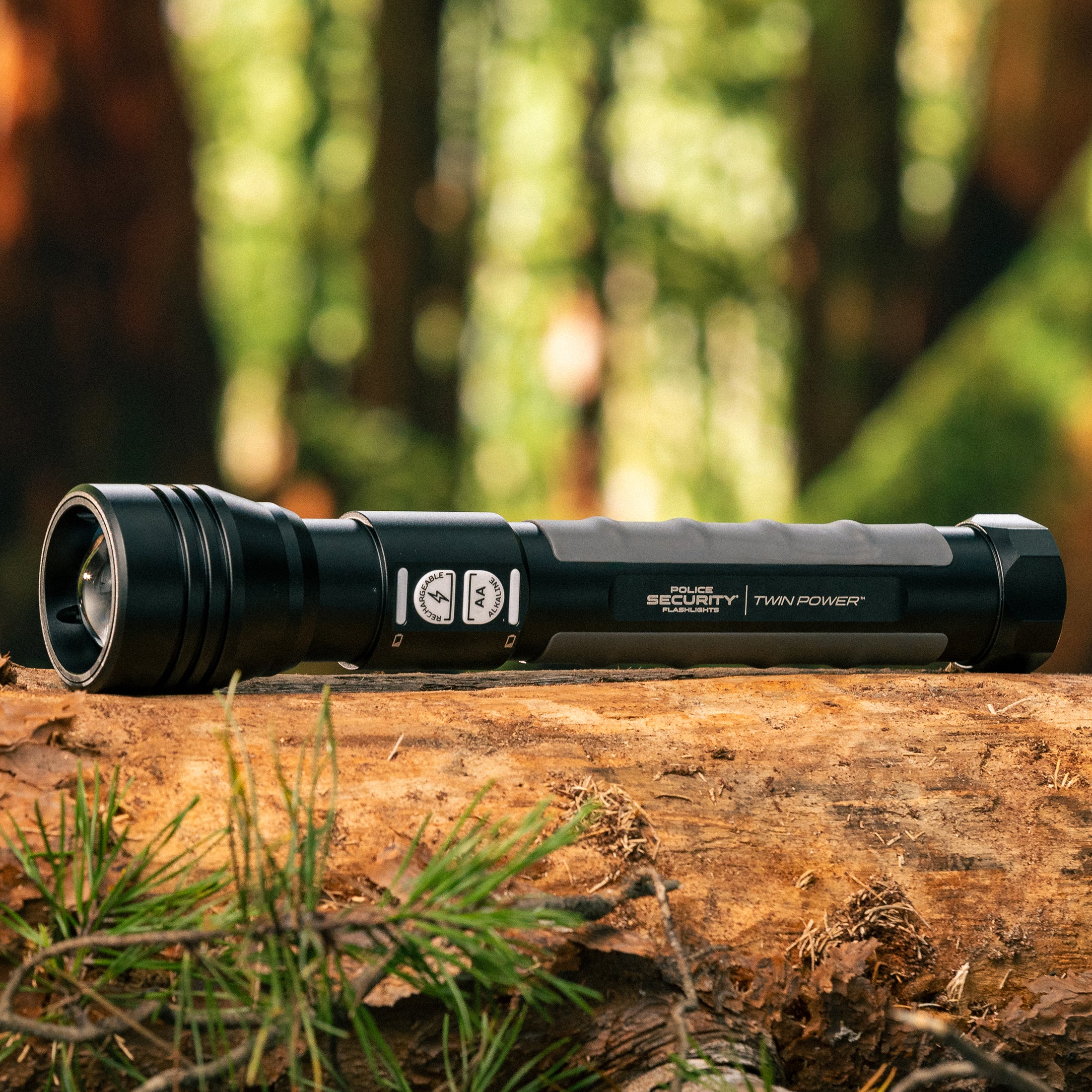 a hero image of a Twin Power flashlight in nature