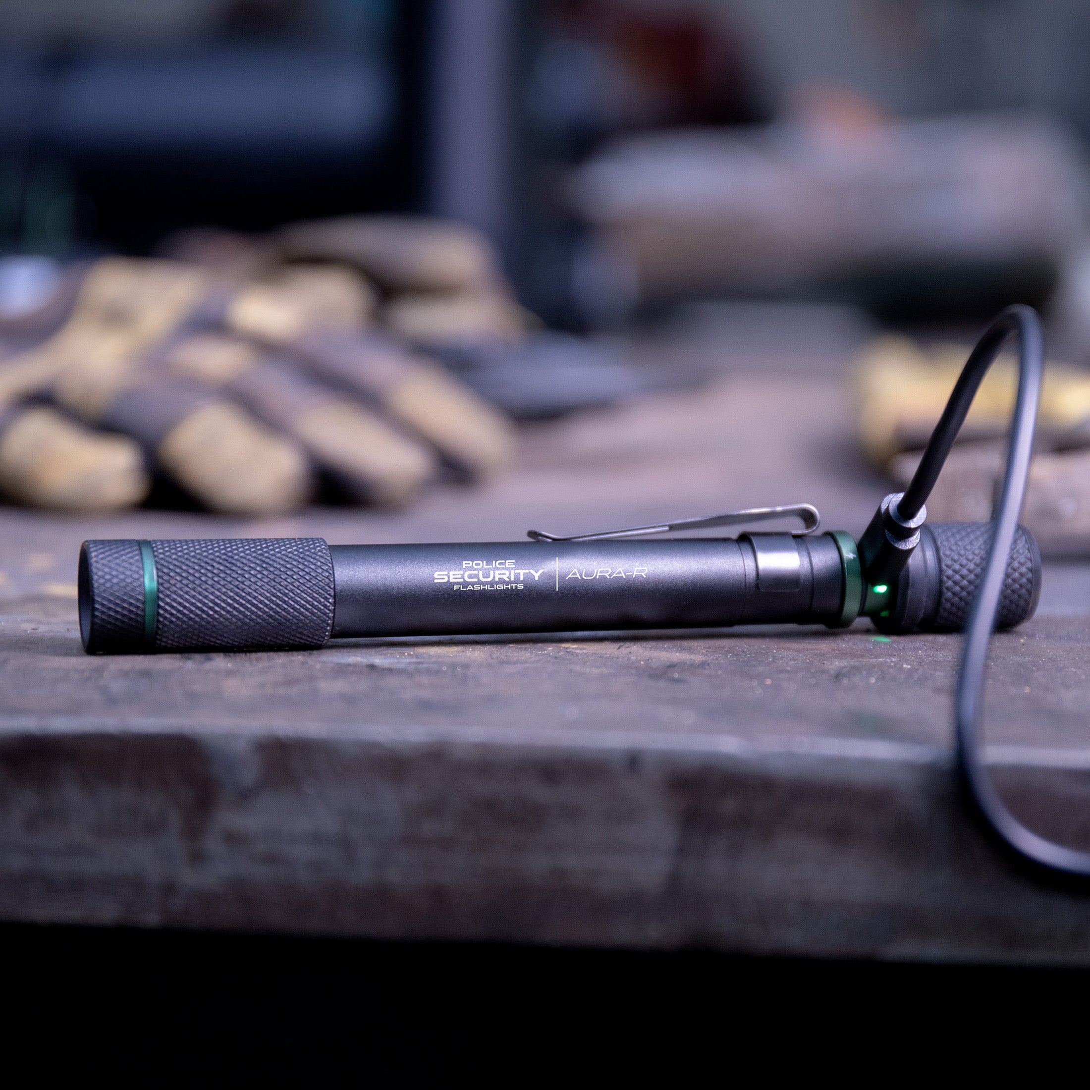 an image of the AURA-R 360 LUMEN RECHARGEABLE PENLIGHT charging