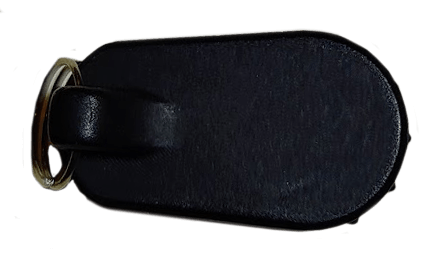 A black Seeker-r keychain flashlight with a matching split ring, shown on a plain white background.