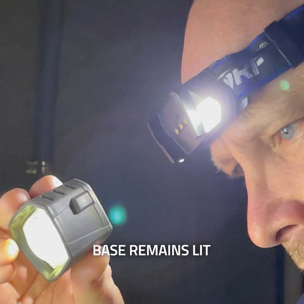 An image of a man wearing the MORF R230 headlamp with the removable light in his hand and a caption "Base remains lit"