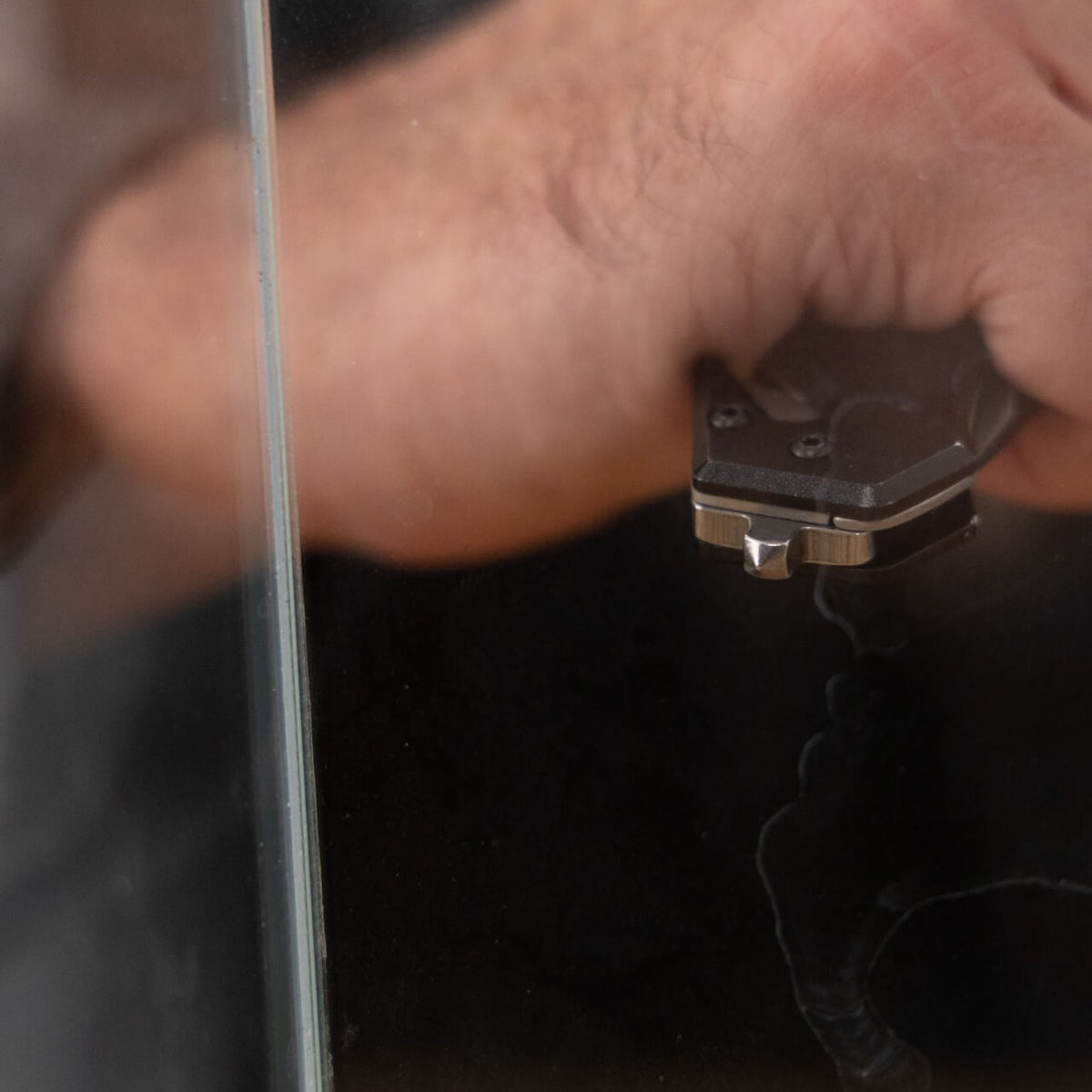 A close-up image of the glass-breaking butt of the Shield pocket knife from Police Security 