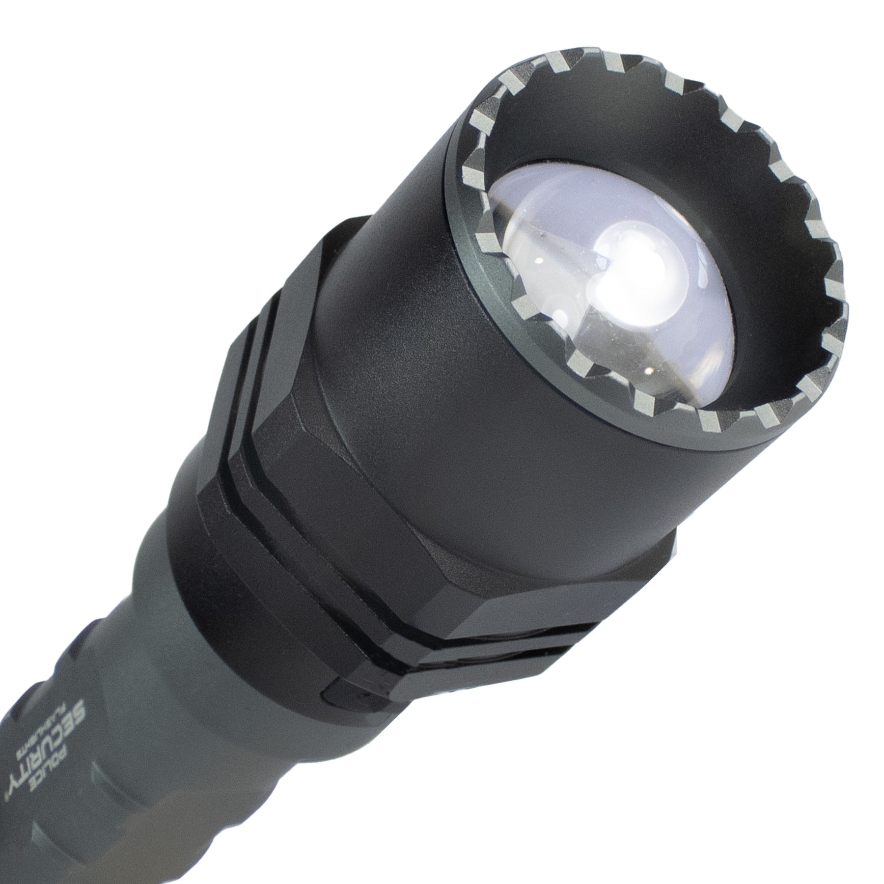 Lens of the long throw rechargeable flashlight showing strike bezel