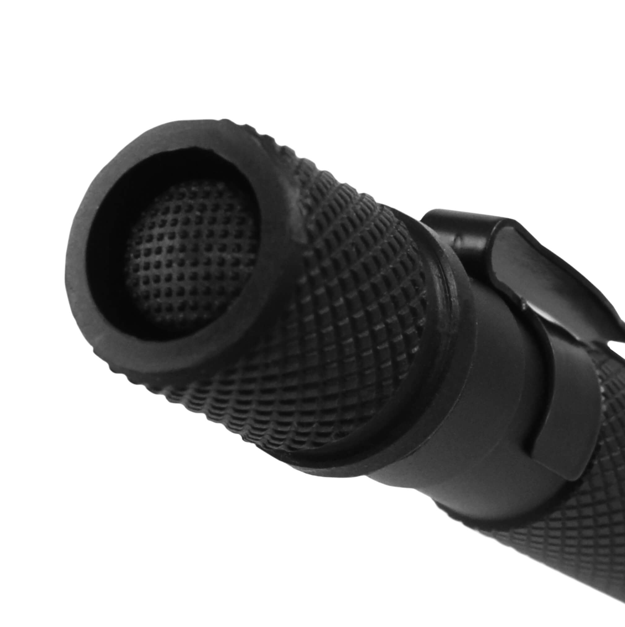 Close-up of a Police Security Cavalier penlight showing the tail cap button and side clip against a plain white background.