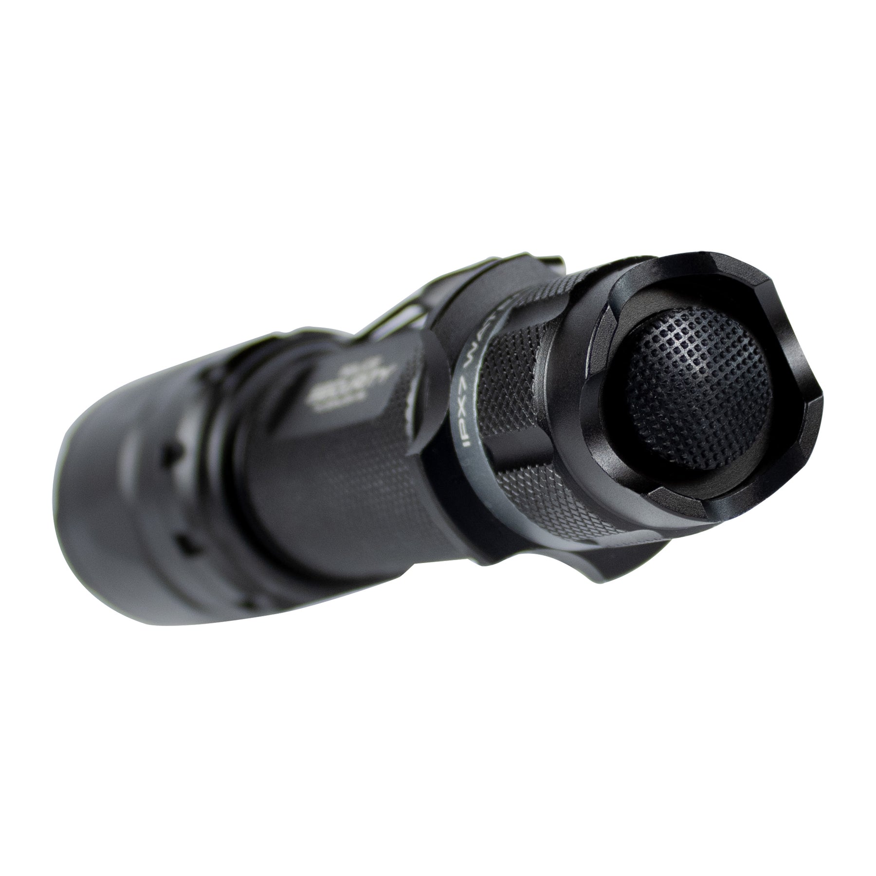 A close-up photo of the tactical tail switch on the Trac Tact-R flashlight