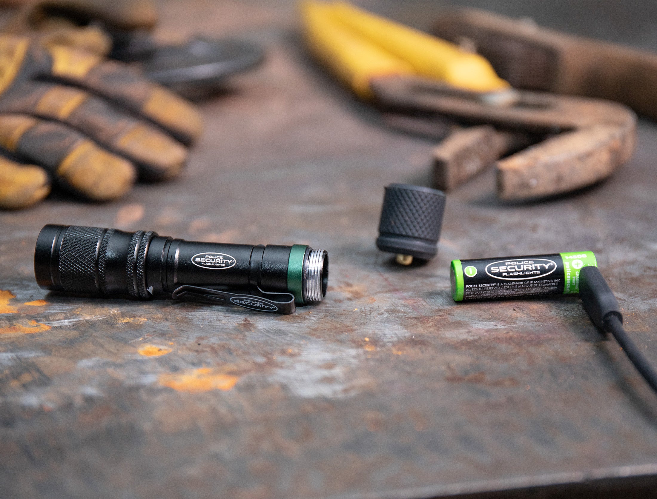 An image of the PROFLEX flashlight with its battery disassembled 