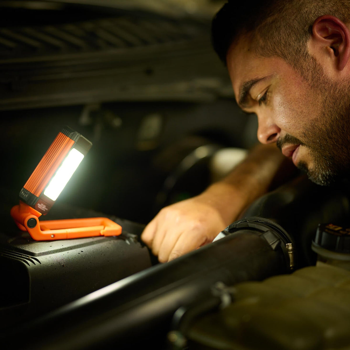 Kickstand-R Mini used to work on a vehicle
