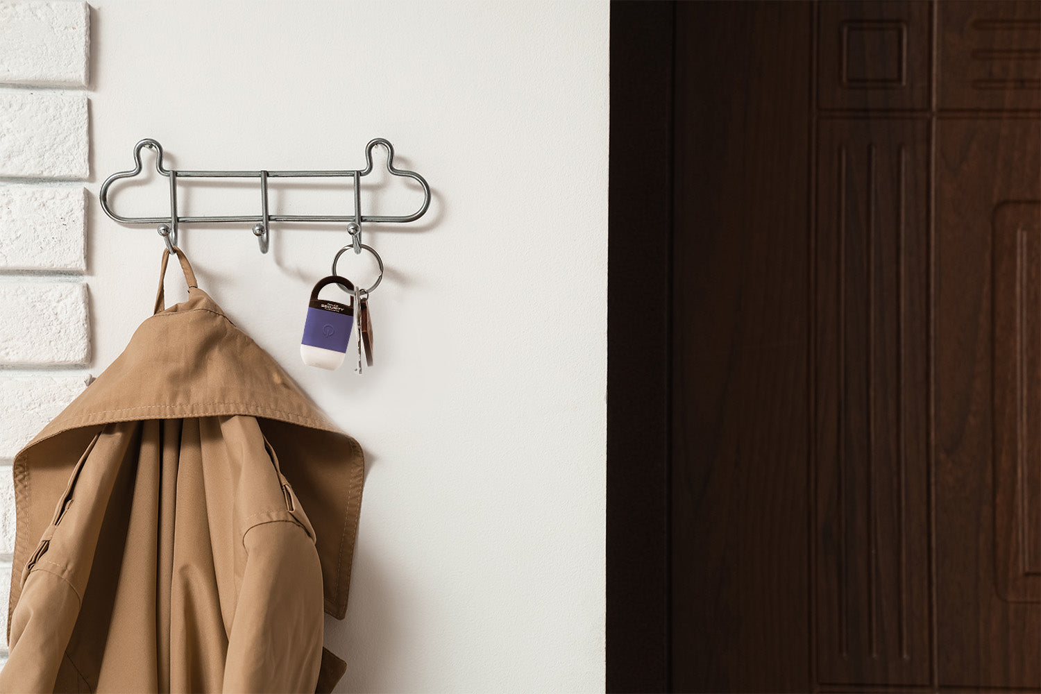 Squeeze Light clipped to keys on a coat hook