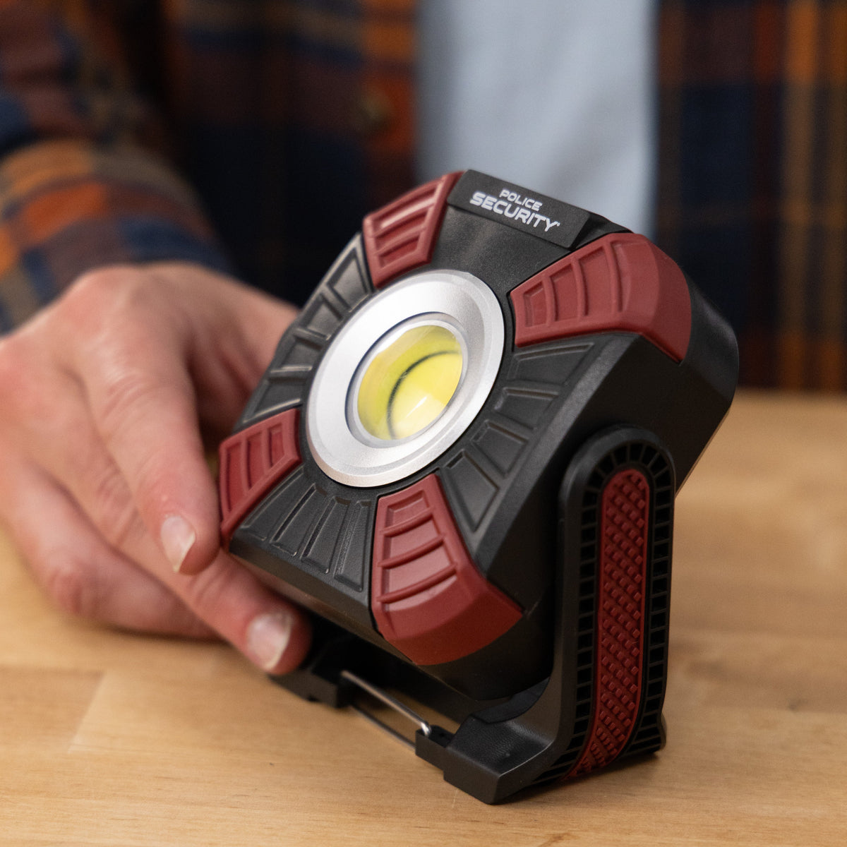 The Kickstand Pro worklight on a wooden table